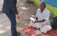 Donating food to destitute people in Madurai City to observe International Day for the Eradication of Poverty